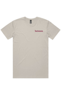 Cream cotton T-shirt featuring "between" embroidered in burgundy script on the left chest.